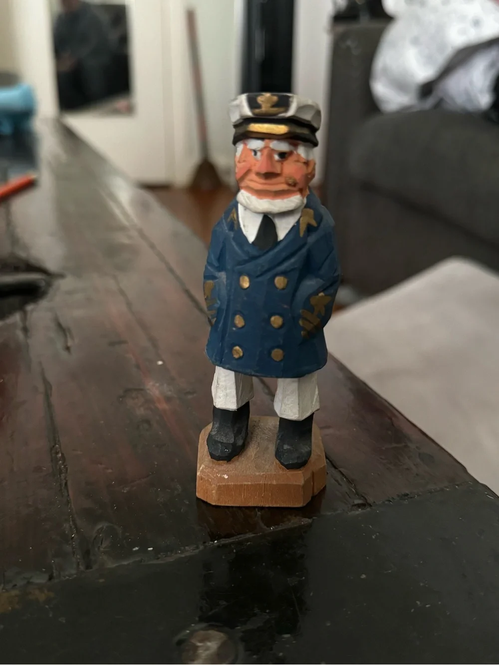 Hand-Carved Captain Figurine in Navy Blue Coat